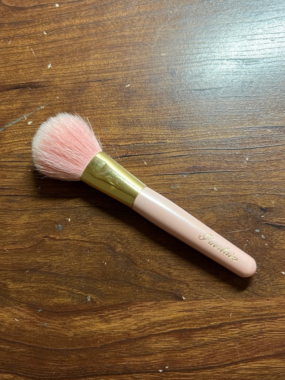 Pink Guerlain blush brush